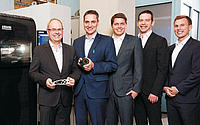 At the ARBURG Innovation Center at KIT: Prof. Dr. Jürgen Fleischer (Director of the wbk), Martin Neff (Head of the Plastics Free-Form Department at ARBURG) and the scientists from the wbk's Lightweight Manufacturing working group Florian Baumann, Sven Coutandin (Senior Engineer Lightweight Manufacturing) and Jörg Dittus (from left to right).