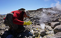 Valentin Goldberg sampling thermal water in Chile.